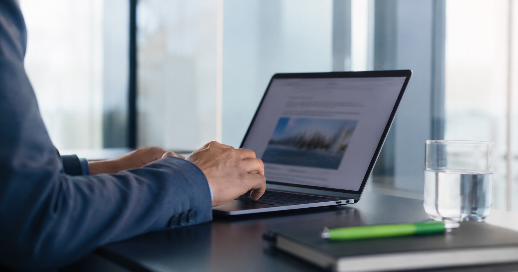 Professional completing Aspire digital learning training on a laptop